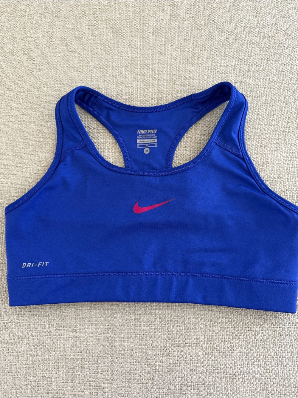 Nike Women’s Blue Sports Bikini Top with Pink Swoosh. NWOT
